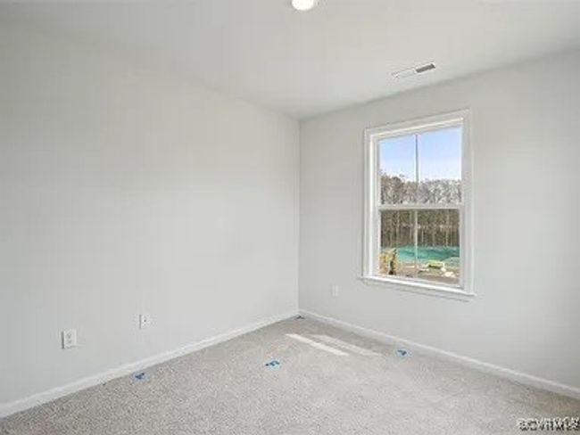 Empty room with baseboards and carpet | Image 27