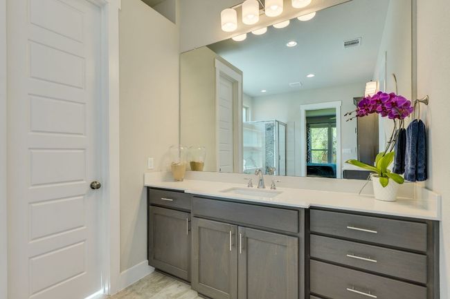 Primary bathroom with dual vanities | Image 26