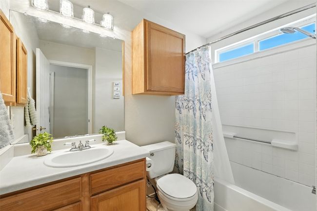 Full bath featuring shower / bath combo and vanity | Image 22