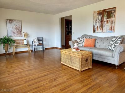 Living room featuring hardwood / wood-style floors | Image 2