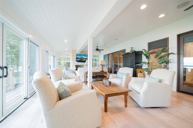 Living room featuring recessed lighting, crown molding, light wood-type flooring, and a ceiling fan | Image 40