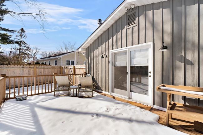 Snow covered deck with fence | Image 36