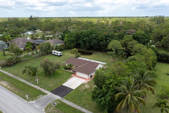 15429 Temple Blvd, House other with 3 bedrooms, 2 bathrooms and null parking in Loxahatchee FL | Image 50