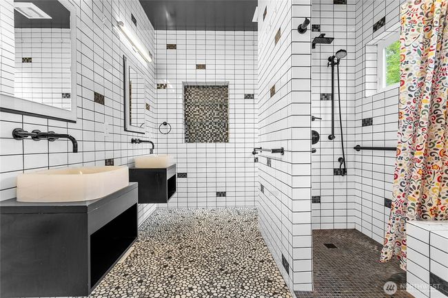 Custom en suite bathroom with dual sinks and a Roman shower. You've gotta see this! | Image 30