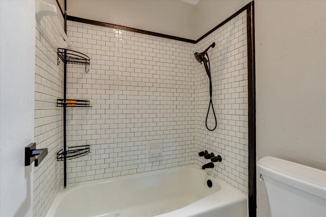 Full bath featuring toilet and shower / bathtub combination | Image 9
