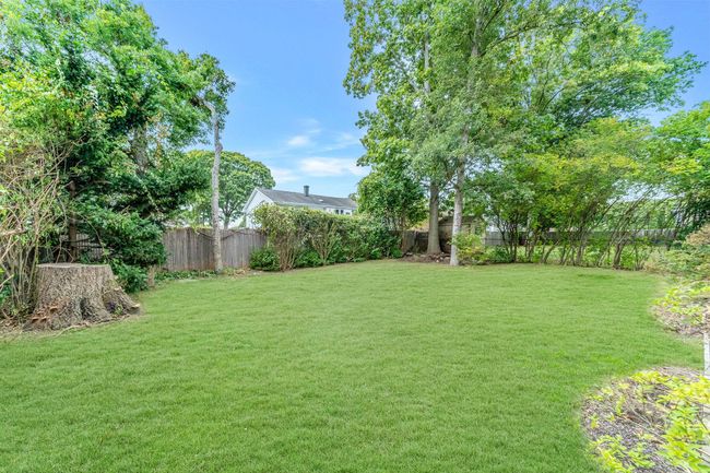 View of yard with a fenced backyard | Image 23