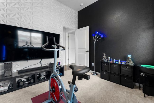 Exercise area with baseboards and carpet floors | Image 27