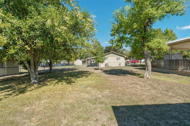 702 S Groos St, House other with 3 bedrooms, 2 bathrooms and 4 parking in Kyle TX | Image 25