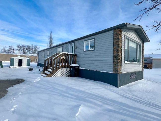 116 Coachman Village, Home with 3 bedrooms, 1 bathrooms and 1 parking in Grande Prairie AB | Image 1