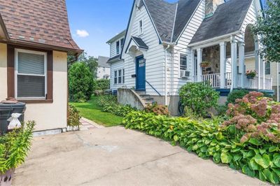 View of home's exterior featuring covered porch | Image 2