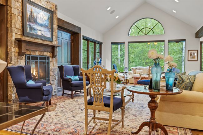 View from entrance to vaulted ceiling living area. | Image 18