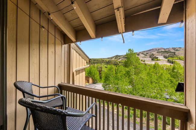 Balcony featuring a mountain view | Image 18