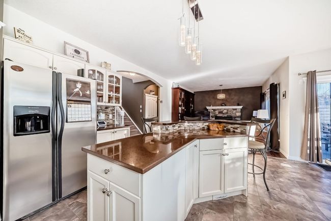 39 Bow Ridge Drive, House other with 3 bedrooms, 4 bathrooms and 2 parking in Cochrane AB | Image 6