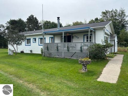 509 Bridge St, East Tawas, MI, 48730-9703 | Card Image