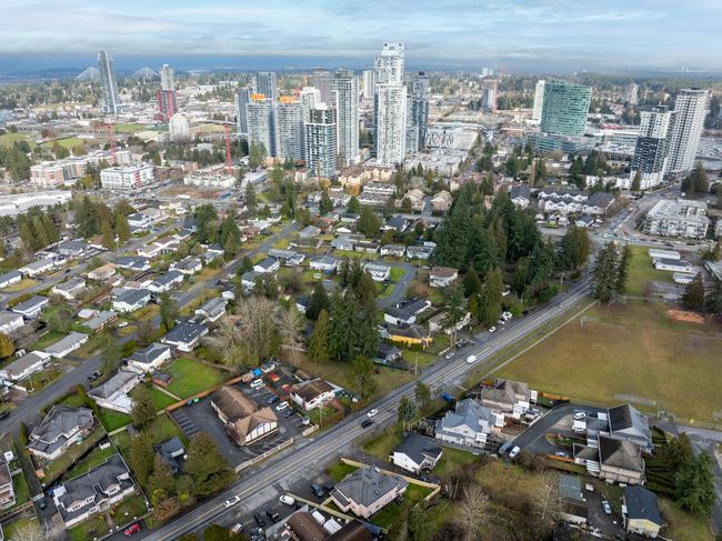 Aerial view of property's location with nearby urban area | Image 8