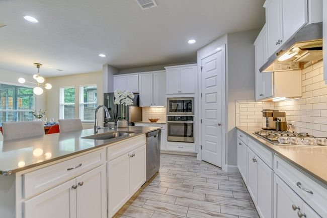 7105 Windthorst Cv, House other with 4 bedrooms, 3 bathrooms and 4 parking in Austin TX | Image 7