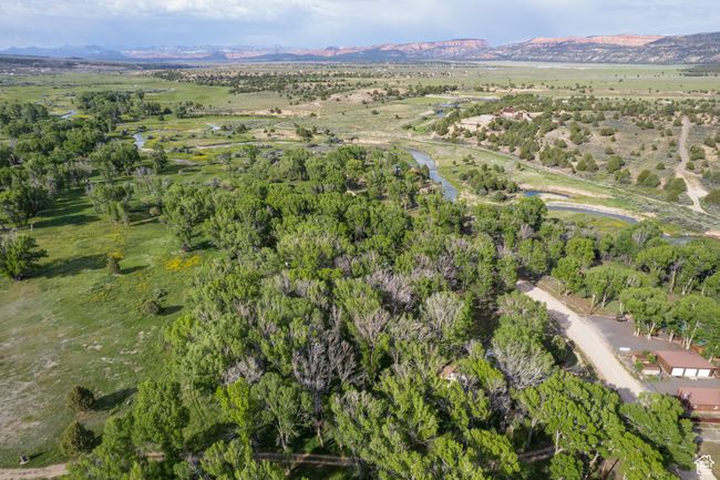 Aerial view of property and surrounding area with a mountainous background | Image 54