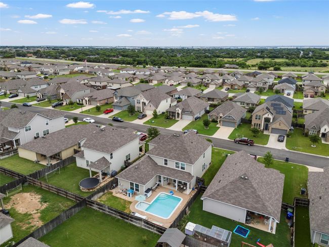 Aerial view of residential area with a pool area | Image 36