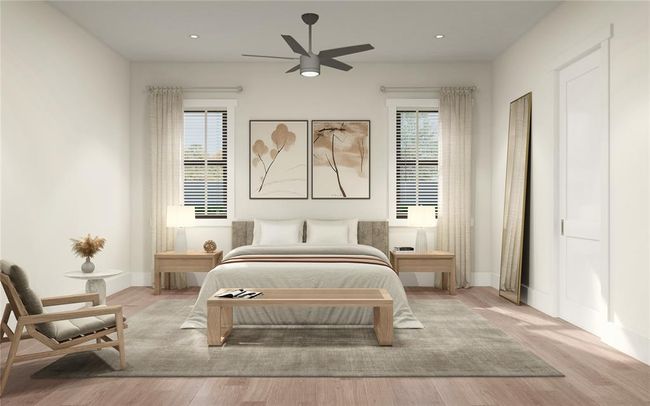 Primary bedroom is tucked away in your own corner on the second floor. Two additional bedrooms are upstairs while there is a secondary primary bed/bath downstairs as well. | Image 5