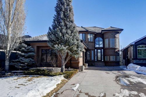 94 Mckenzie Lake Island Se, Home with 4 bedrooms, 4 bathrooms and 7 parking in Calgary AB | Card Image