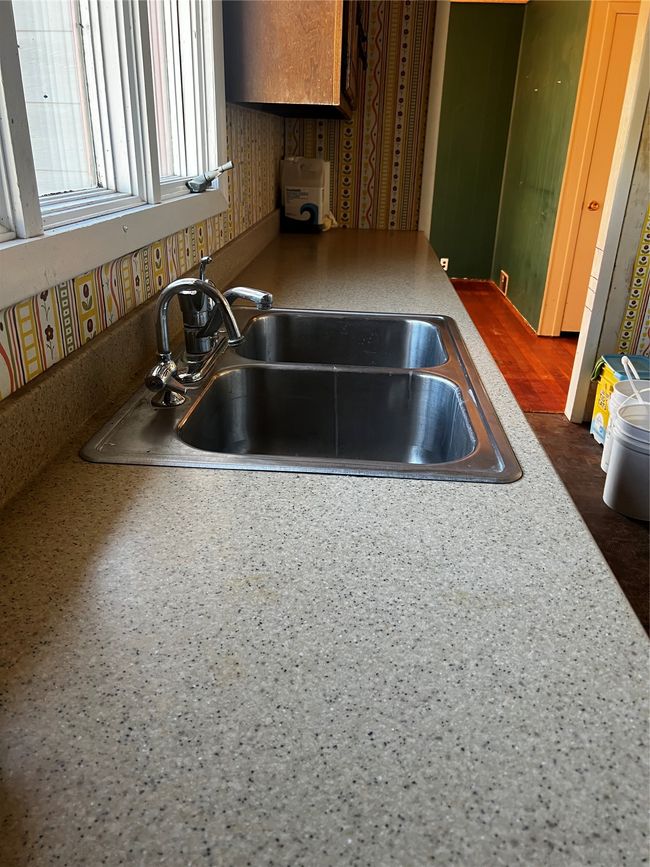 Kitchen featuring a sink | Image 64