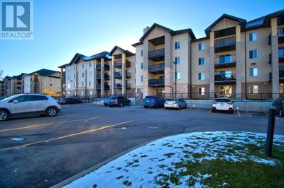 304 Mackenzie Way Sw, Condo with 2 bedrooms, 2 bathrooms and 2 parking in Airdrie AB | Image 2