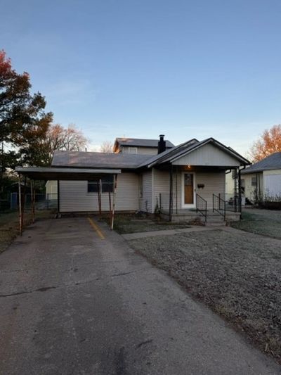 View of front of property with a carport | Image 1