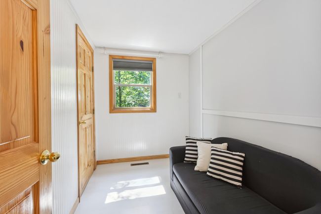 This third bedroom makes a nice office for remote workers. Fiber optic interest is easily accessible for hookup right at the main road! OR - set up bunkbeds in here like the previous owners for extra children. | Image 12