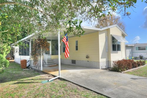 884 Pecan Cir, Barefoot Bay, FL, 32976-7392 | Card Image