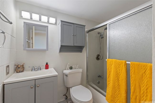 Remodeled bathroom with glass shower door! | Image 10