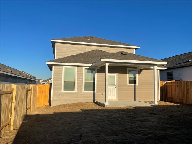Back of property featuring a fenced backyard and roof with shingles | Image 22
