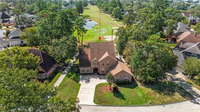 This impressive aerial view showcases the prime location of this lot, perfectly positioned with a scenic golf course backdrop. | Image 2