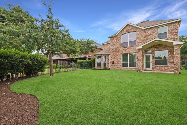 View of yard- grass has been digitally enhanced. | Image 29