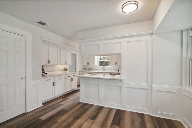 A view of the picturesque kitchen from the breakfast area. | Image 14