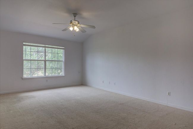 Upstairs game room/2nd living has a view of the golf course and the back deck. | Image 16