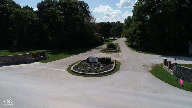 view of asphalt road | Image 7