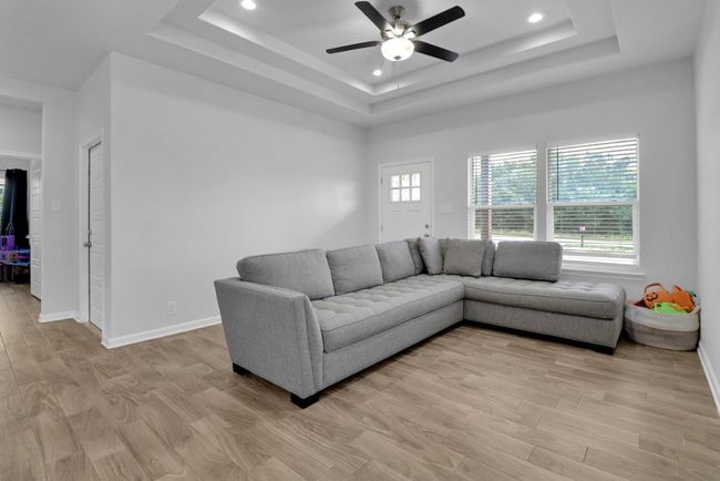 Spacious living room with a recessed ceiling | Image 4