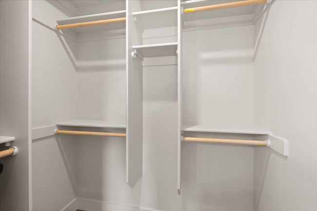 View of spacious closet | Image 17