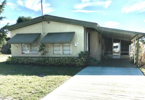 7148 Se Seahawk St, Hobe Sound, FL, 33455-6055 | Card Image