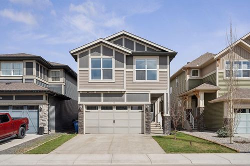 74 Buckskin Way, Home with 4 bedrooms, 3 bathrooms and 4 parking in Cochrane AB | Card Image