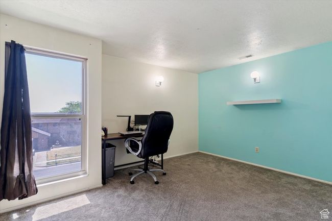 Carpeted office space featuring baseboards | Image 19