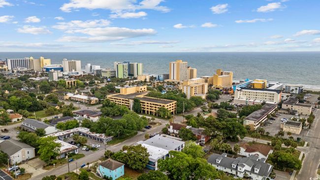View of urban area with a nearby body of water | Image 28