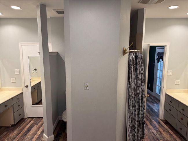 Master bath has double sinks, separate tub & shower. | Image 16