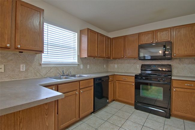 115 Remington Dr, House other with 4 bedrooms, 3 bathrooms and 4 parking in Kyle TX | Image 10