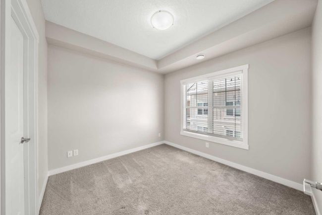 915 Cranbrook Walk Se, Home with 2 bedrooms, 1 bathrooms and 1 parking in Calgary AB | Image 11