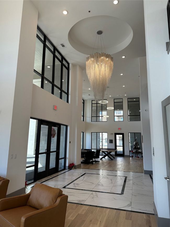 Lobby featuring a high ceiling and recessed lighting | Image 11