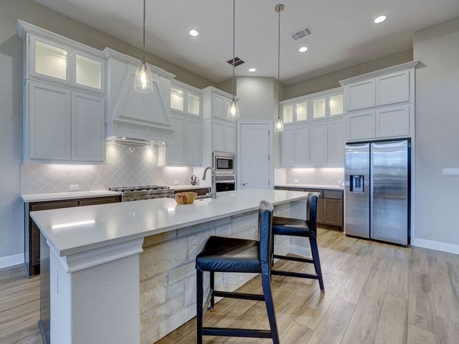 Gorgeous kitchen with tall and lighted cabinets | Image 5