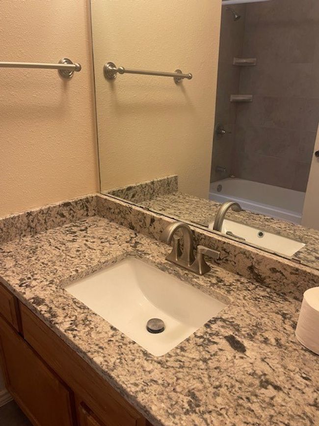 granite counters, newer faucet, light fixtures. | Image 19