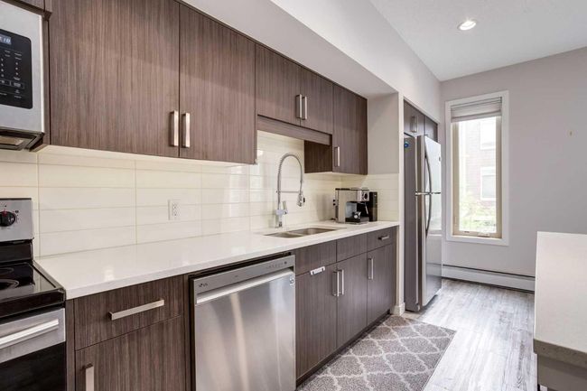 210 - 7 Westpark Common Sw, Condo with 2 bedrooms, 3 bathrooms and 1 parking in Calgary AB | Image 7