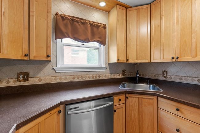 Tall cabinets offer lots of space. | Image 20